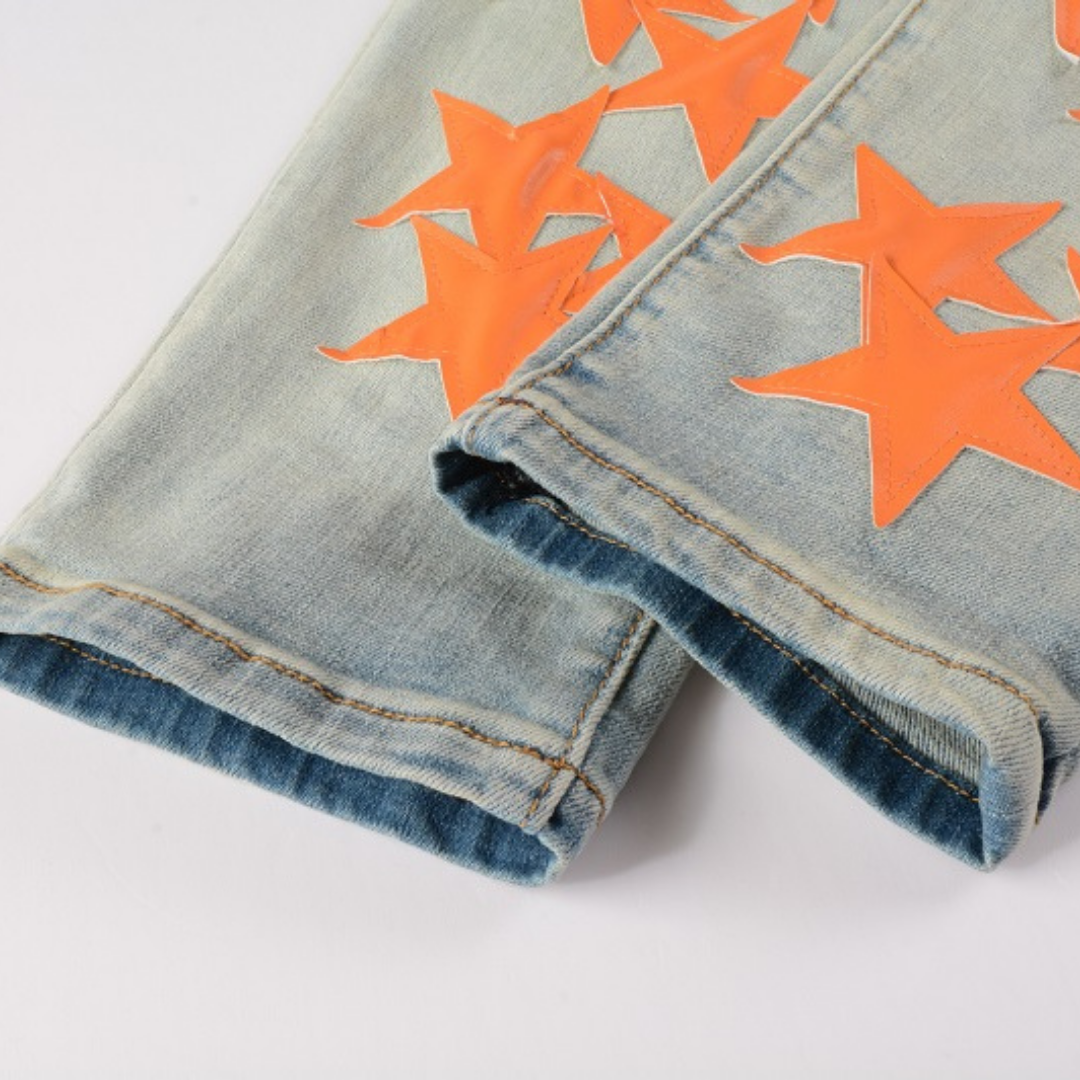 Amiri Orange Star Patch Jeans