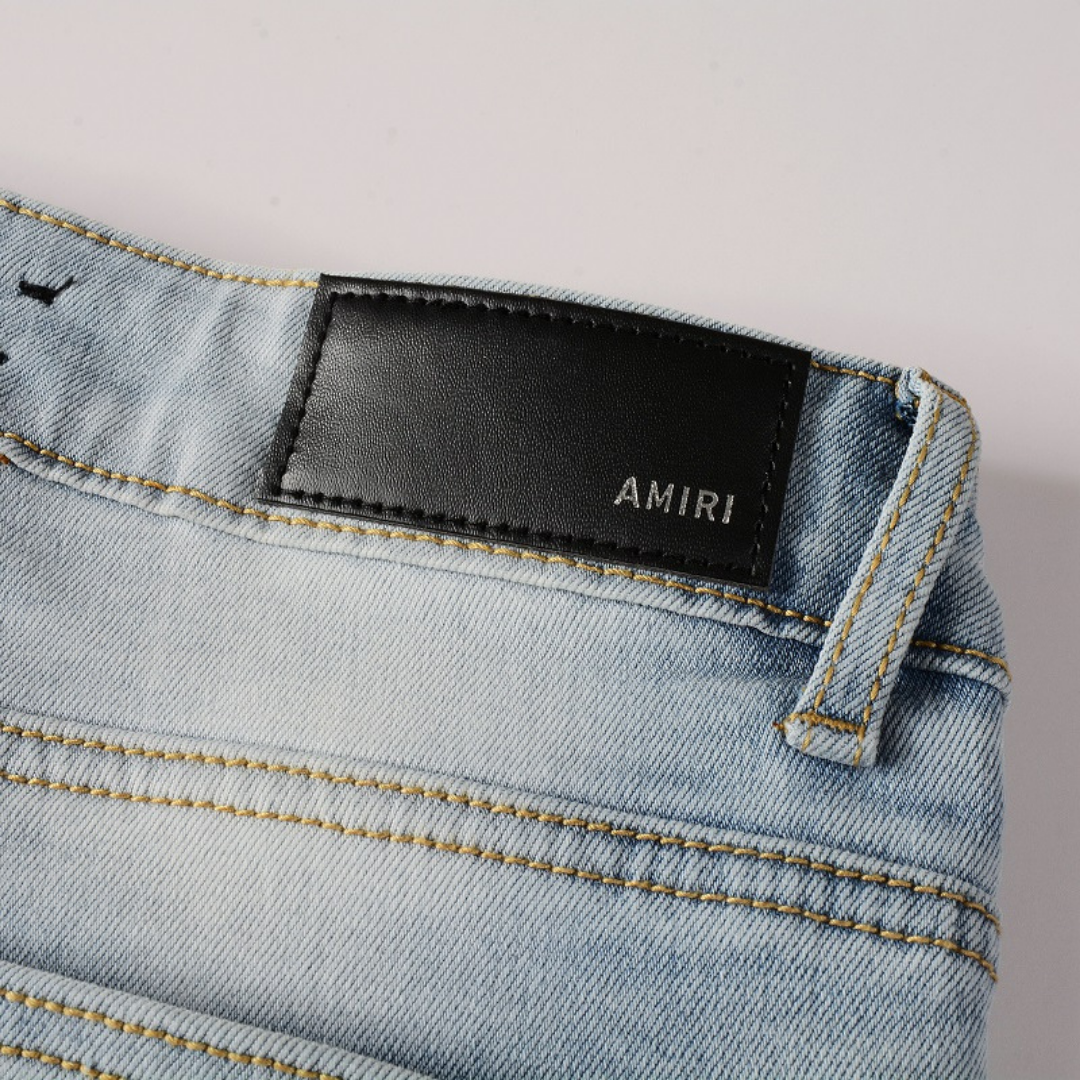 Amiri Black Patch Blue Jeans
