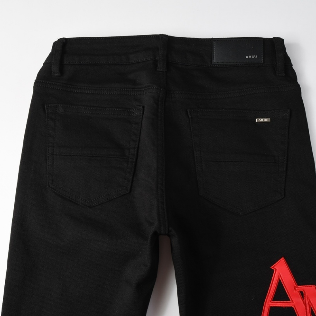 Amr Red Patch Staggered Jeans