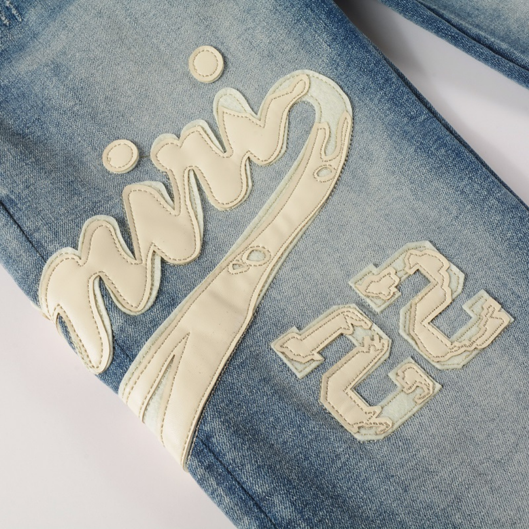 Amiri White Logo Jeans